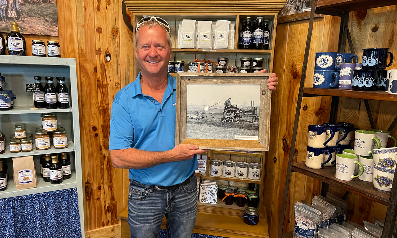 Scott Kamphuis Holding Family Photo