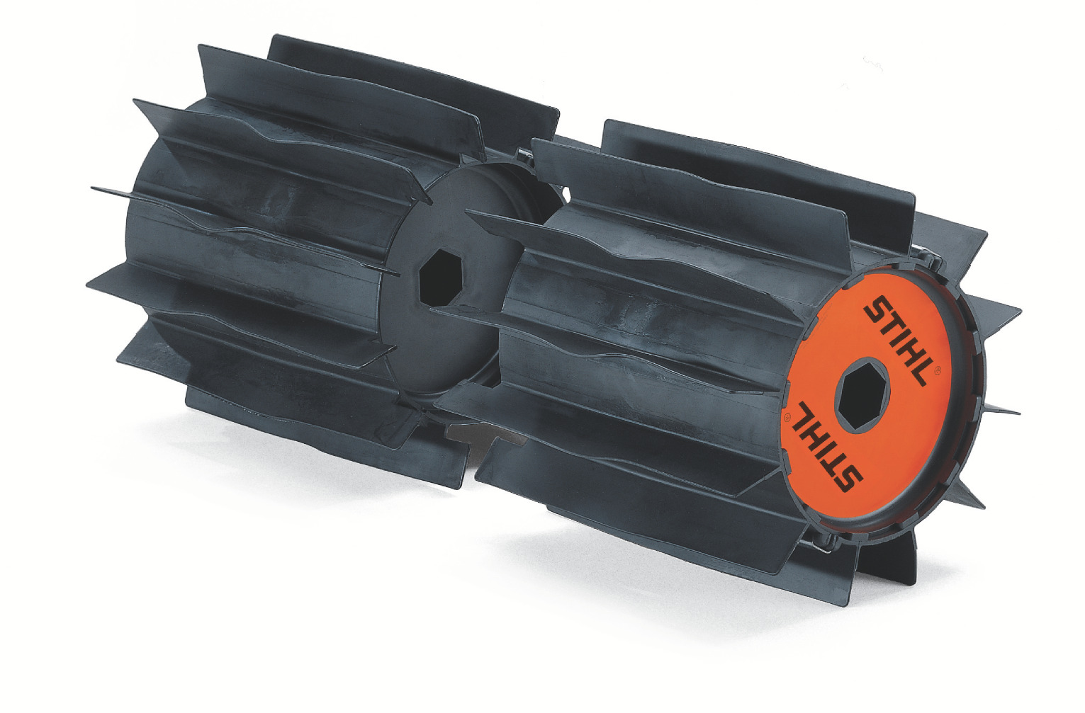 The STIHL YARD BOSS® PowerSweep™ attachment removes caked dirt, pebbles, and even water from your path.