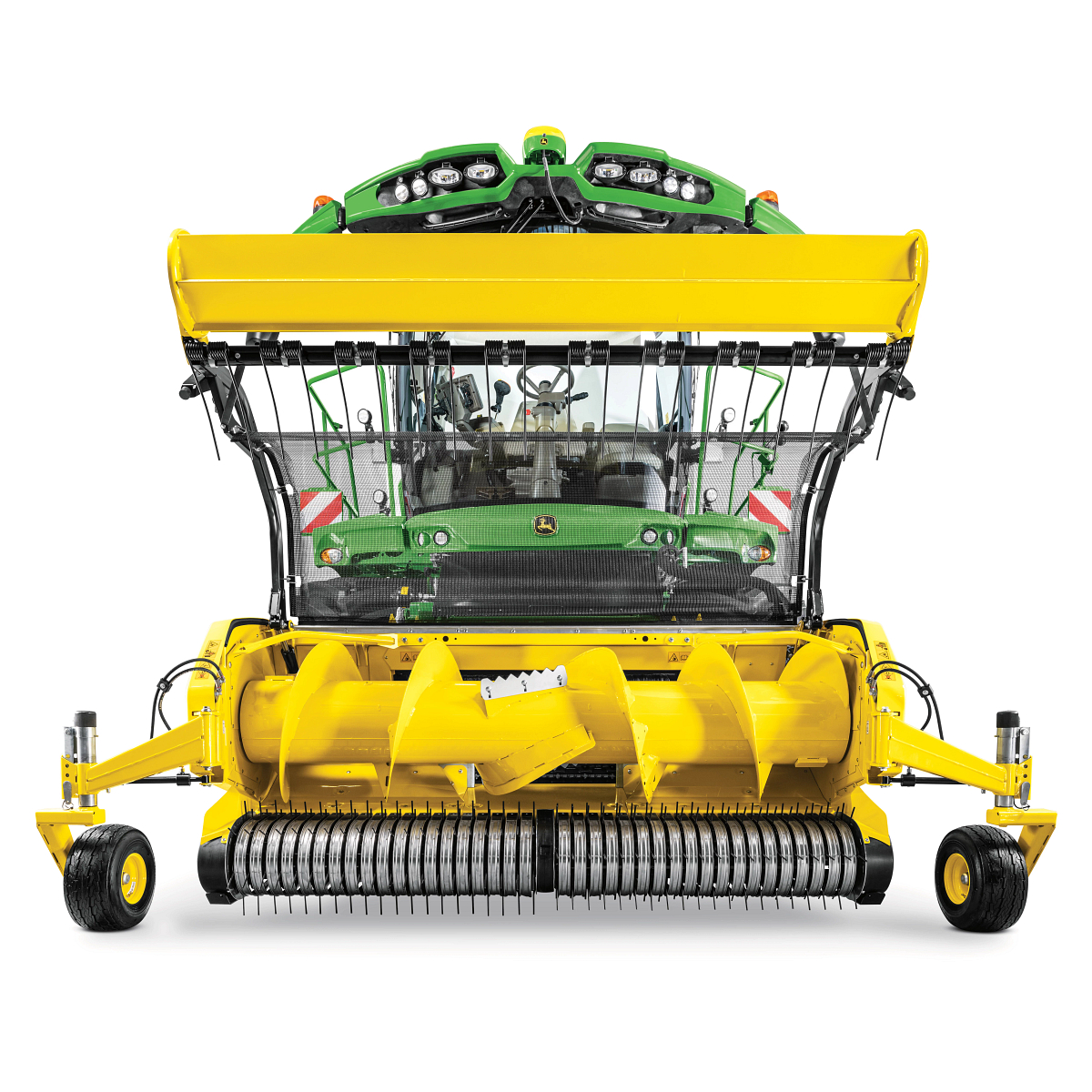 Front view of a forage harvester and its yellow pickup header, with trash net raised to show large auger. roller, and tines