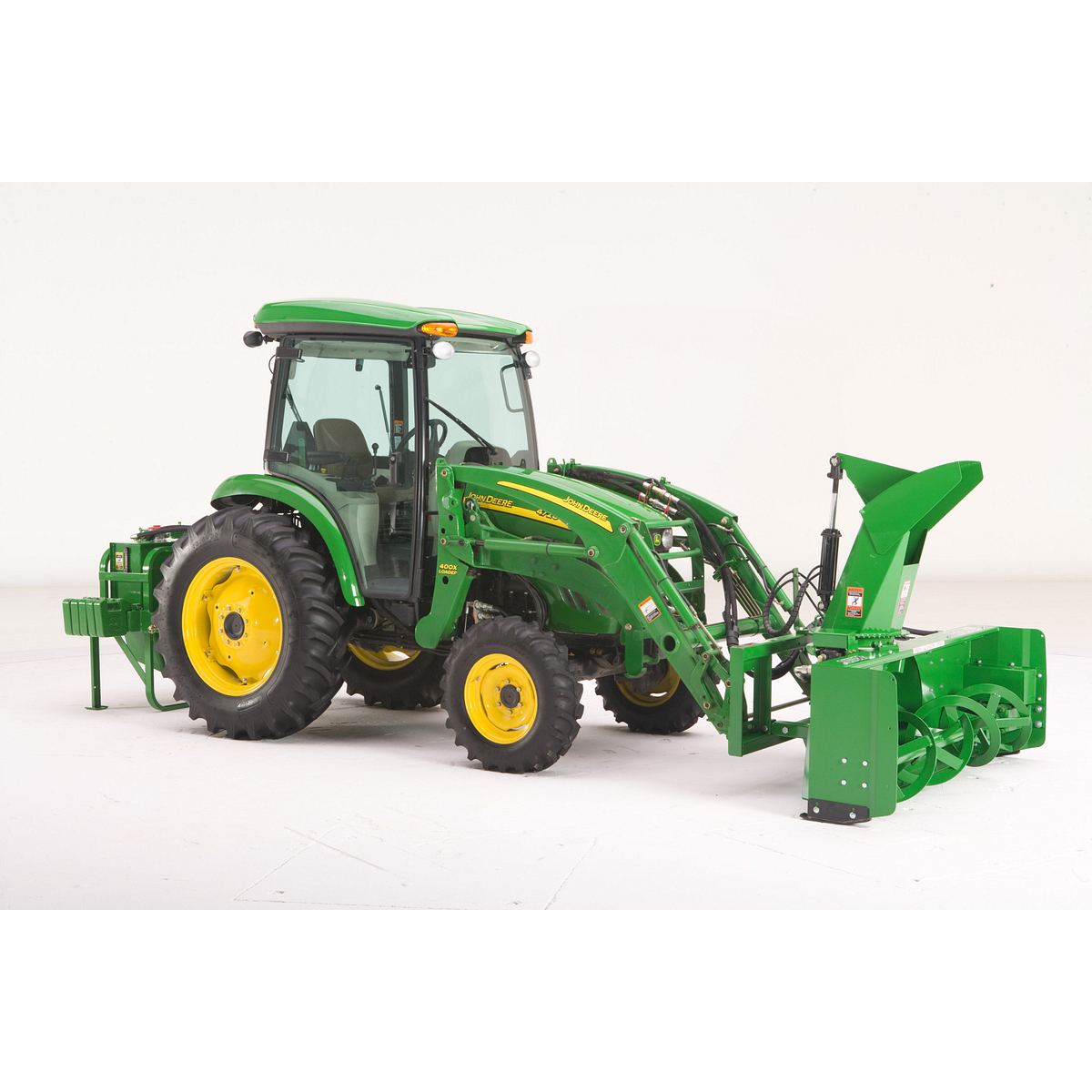 Studio view of 4720 Tractor with loader and SB2176 Snowblower