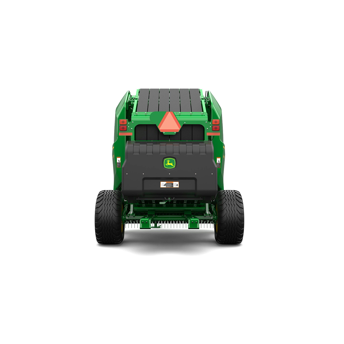 Studio rendering of V452M round baler shown from the rear on a white background, featuring a green body, large black tires, rear cover with John Deere logo over the bale chamber, safety reflector, warning markings, and rear lights