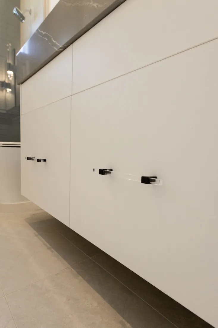 Variety of kitchen cabinet hardware showcasing high-quality and low-quality options for selection