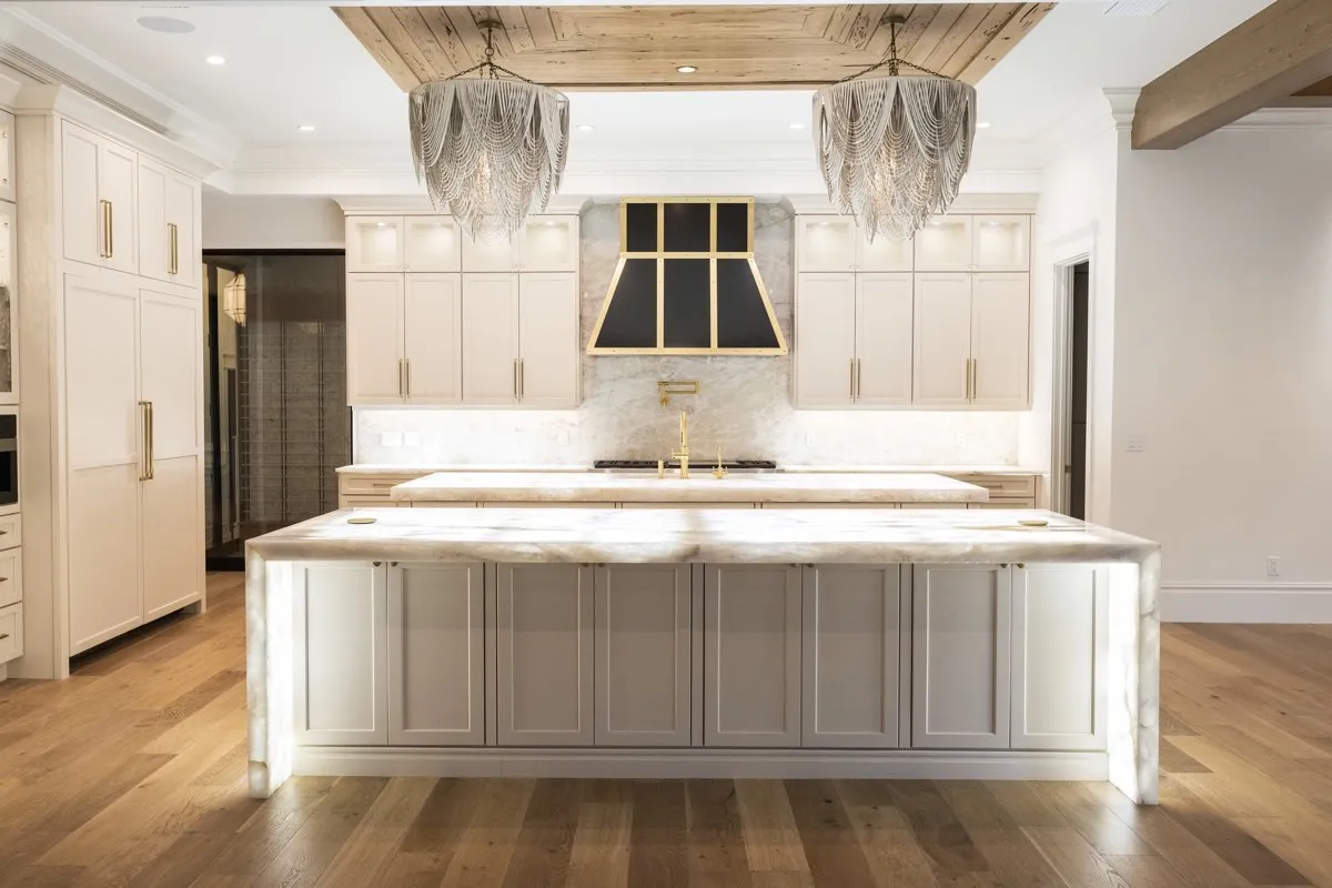 Homeowner planning kitchen remodel with cabinet samples and design inspiration