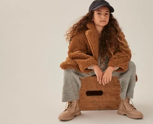 Authentic and engaging kids' photography, expertly captured for commercial advertising, showcasing natural moments and genuine expressions that elevate your brand's storytelling