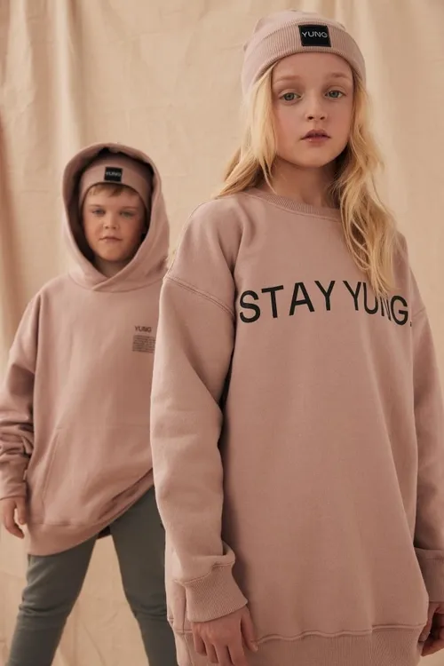 This captivating kids' photography, shot for commercial advertising, blends natural, candid moments with professional styling to create vibrant and engaging images