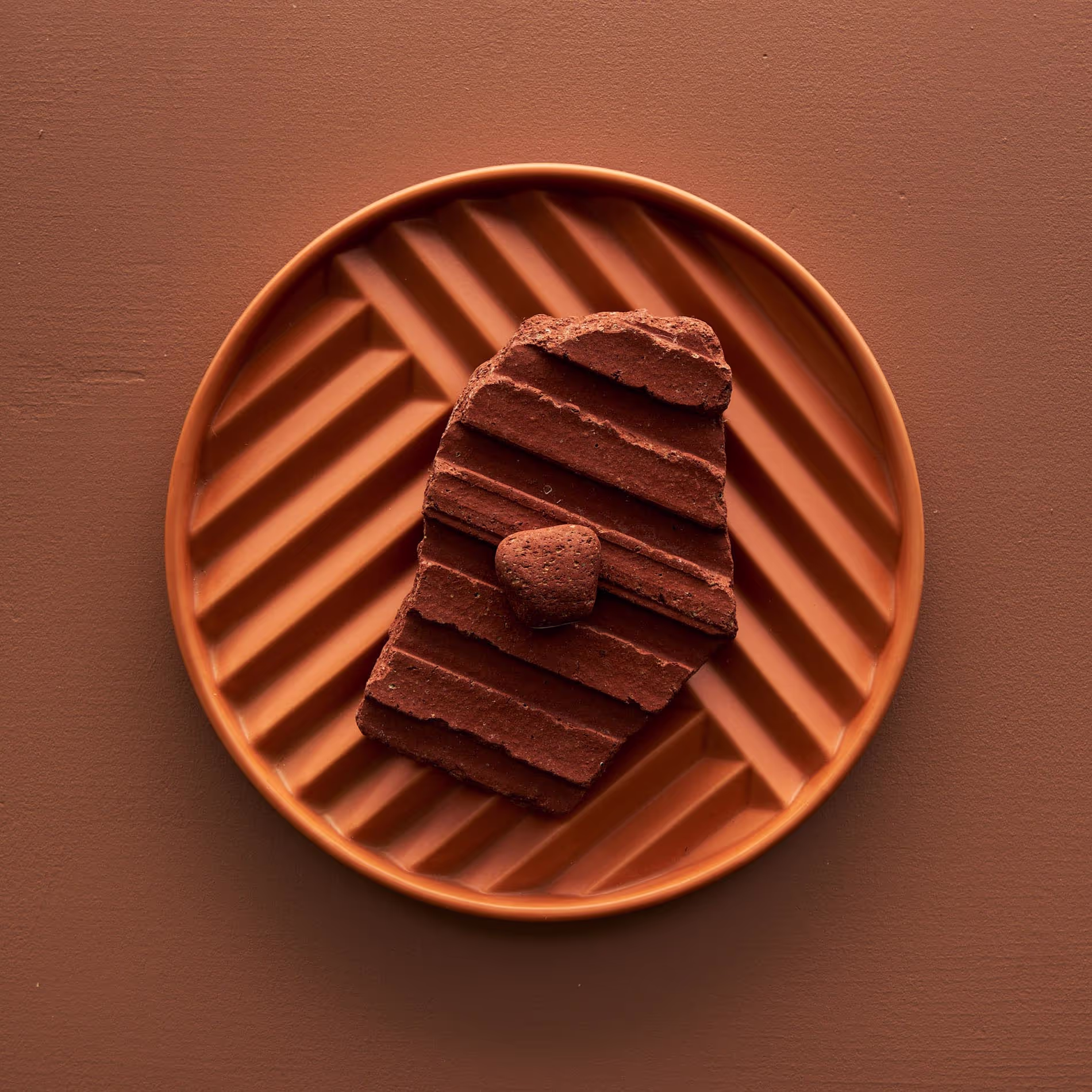 A minimalist yet captivating still life shot by a skilled photographer, focusing on the intricate details and textures of carefully chosen items