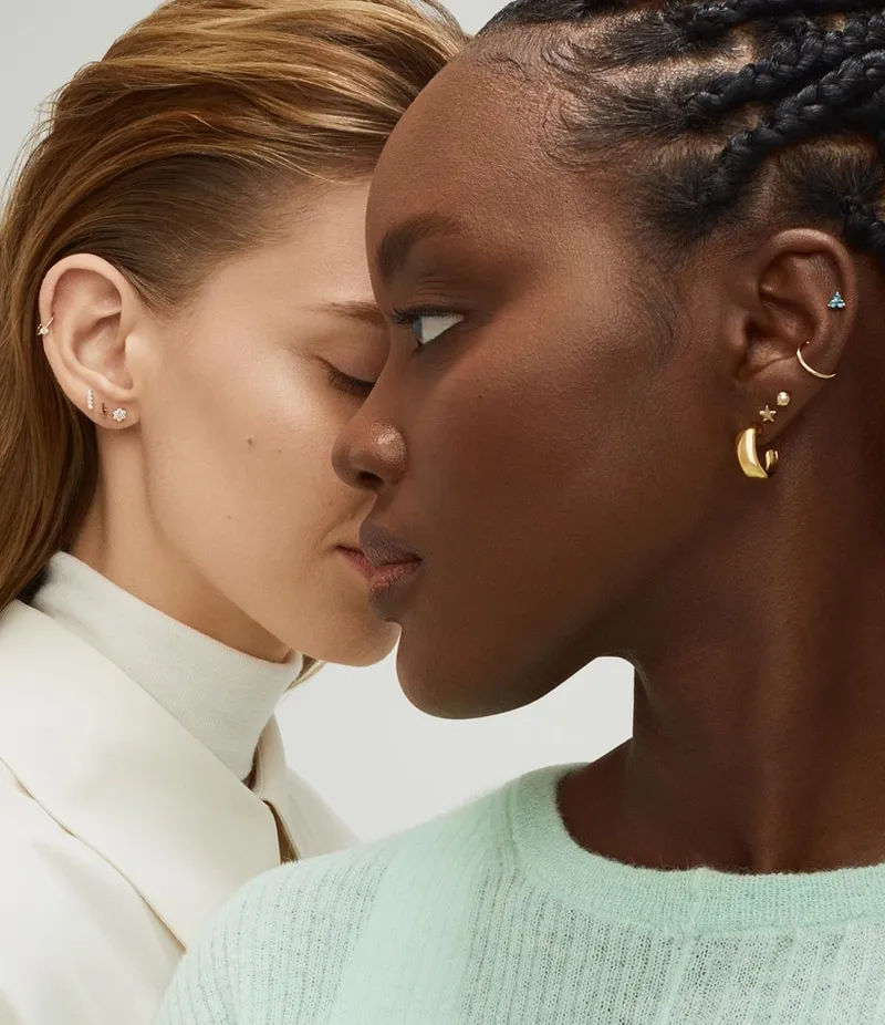 This exceptional beauty photograph, captured by a commercial photographer, features flawless makeup, skin textures, and creative lighting, designed to engage and captivate in commercial advertising