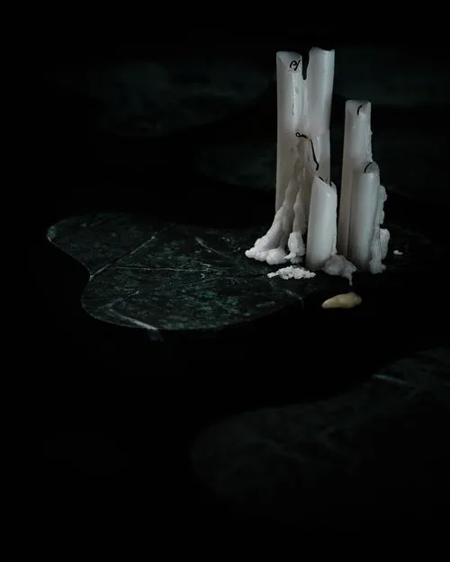 A minimalist yet captivating still life shot by a skilled photographer, focusing on the intricate details and textures of carefully chosen items