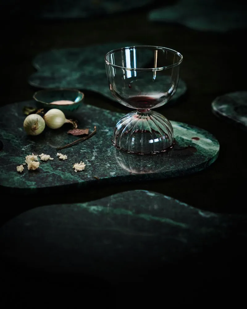 An elegant still life photograph capturing the subtle beauty of inanimate objects, skillfully shot by a talented photographer with a focus on textures and shadows