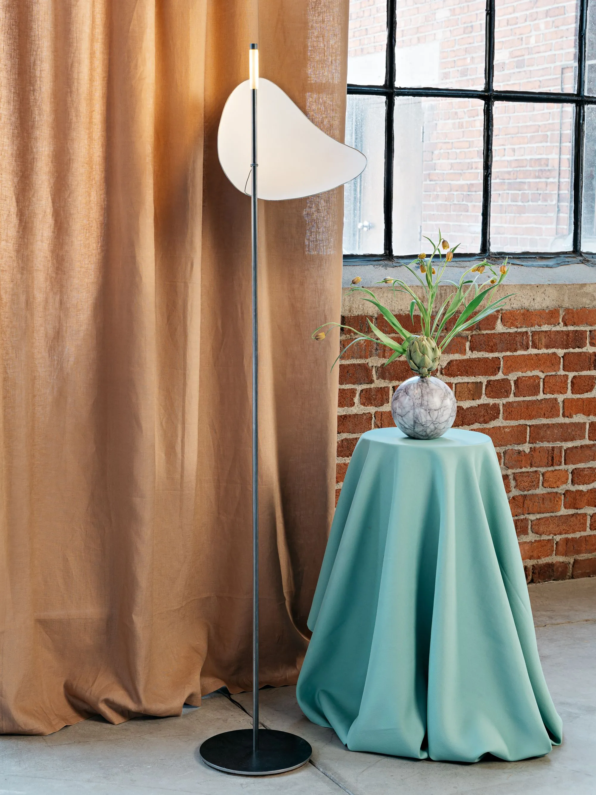 An elegant still life photograph capturing the subtle beauty of inanimate objects, skillfully shot by a talented photographer with a focus on textures and shadows