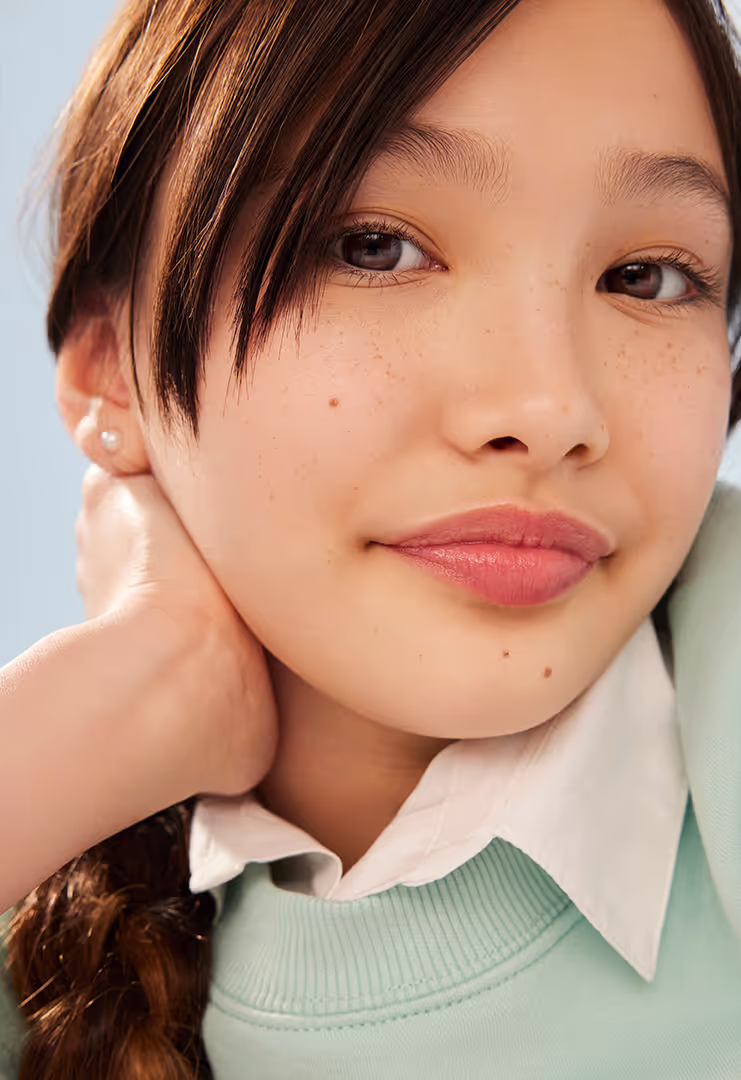 This captivating kids' photography, shot for commercial advertising, blends natural, candid moments with professional styling to create vibrant and engaging images