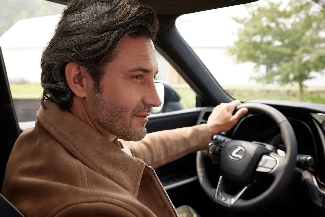 Expert automotive photography blending cars, people, and lifestyle, designed to highlight the connection between individuals and their vehicles, perfect for advertising and brand storytelling