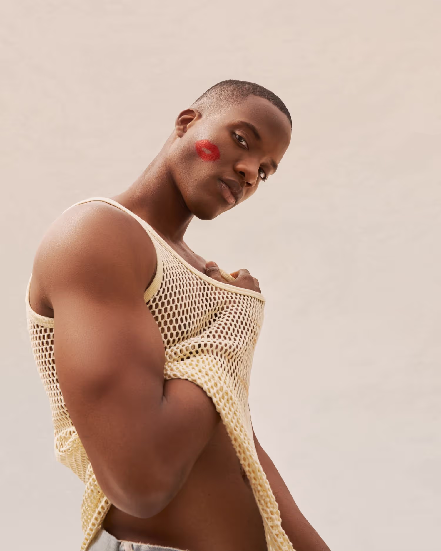 male model photographed on white background 