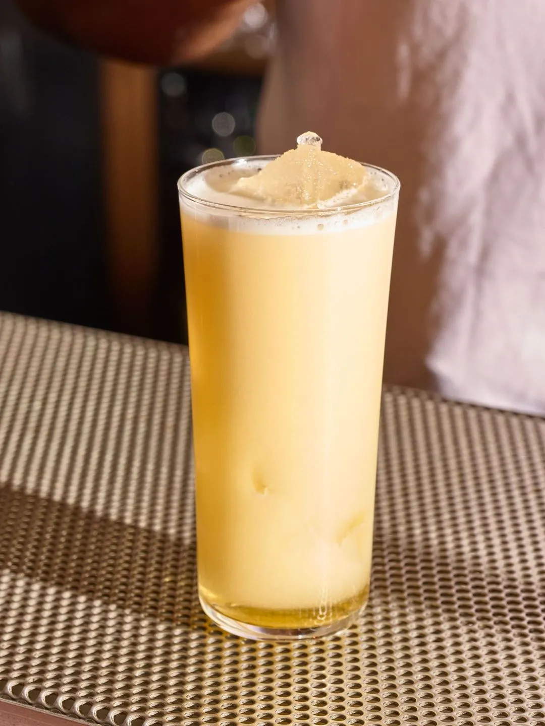 A striking drink photograph that highlights the artistry behind the beverage, expertly lit and composed to capture the refreshing essence of every drop