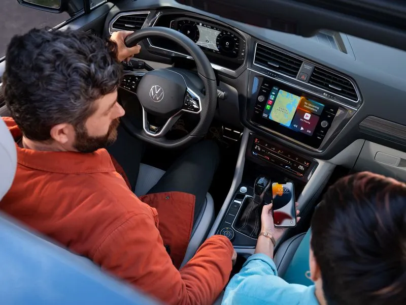 Expert automotive photography blending cars, people, and lifestyle, designed to highlight the connection between individuals and their vehicles, perfect for advertising and brand storytelling