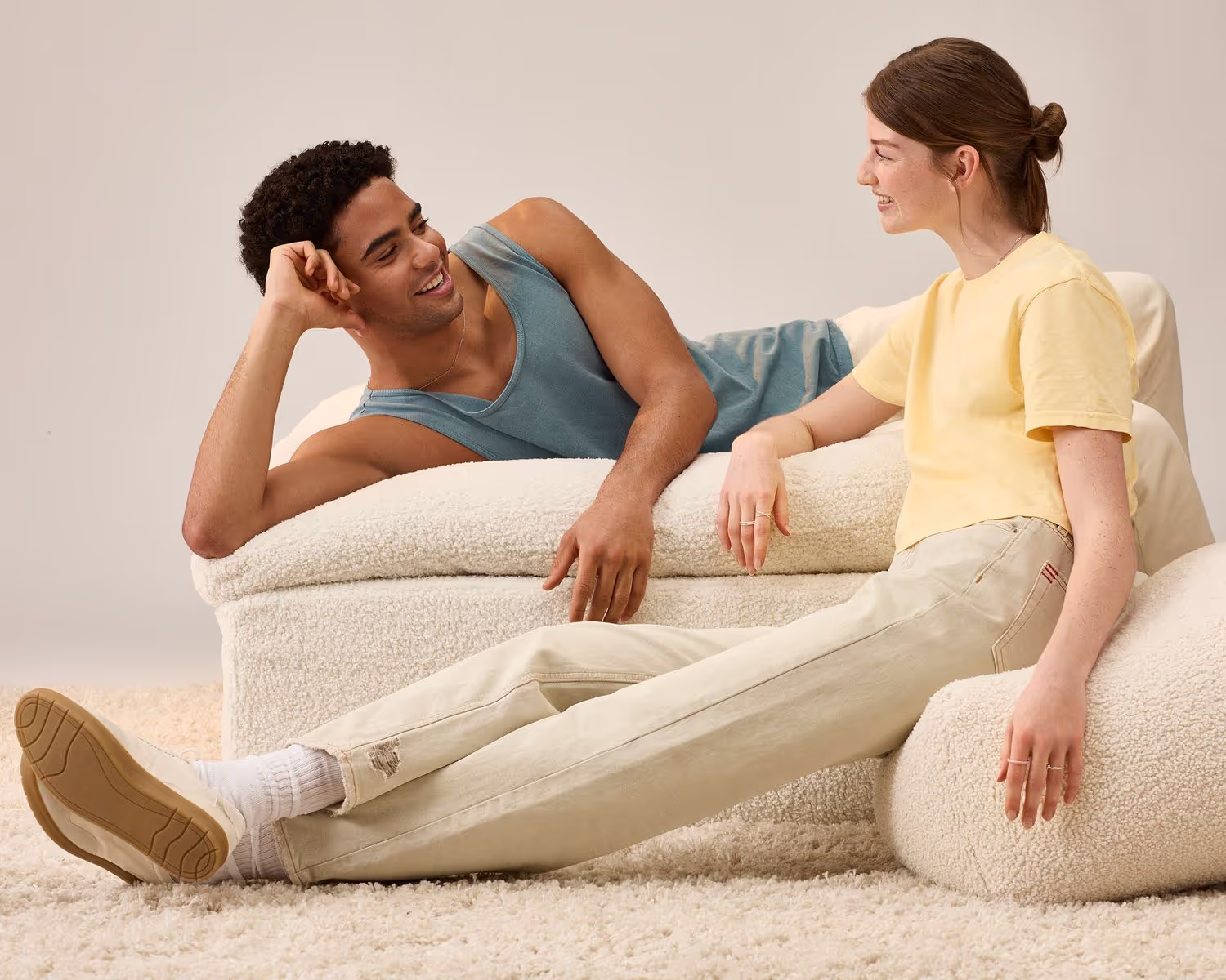 Soft lighting in studio of two models for gap clothing company