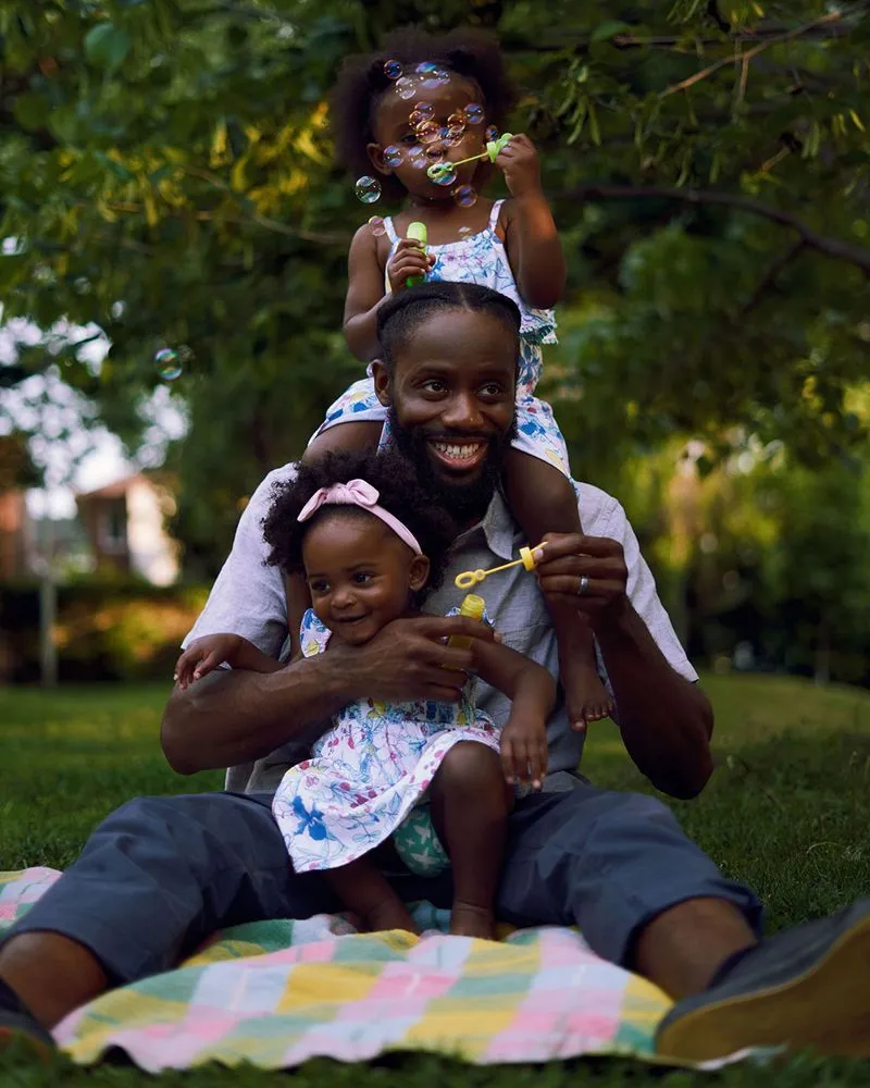 black dad and children family portrait