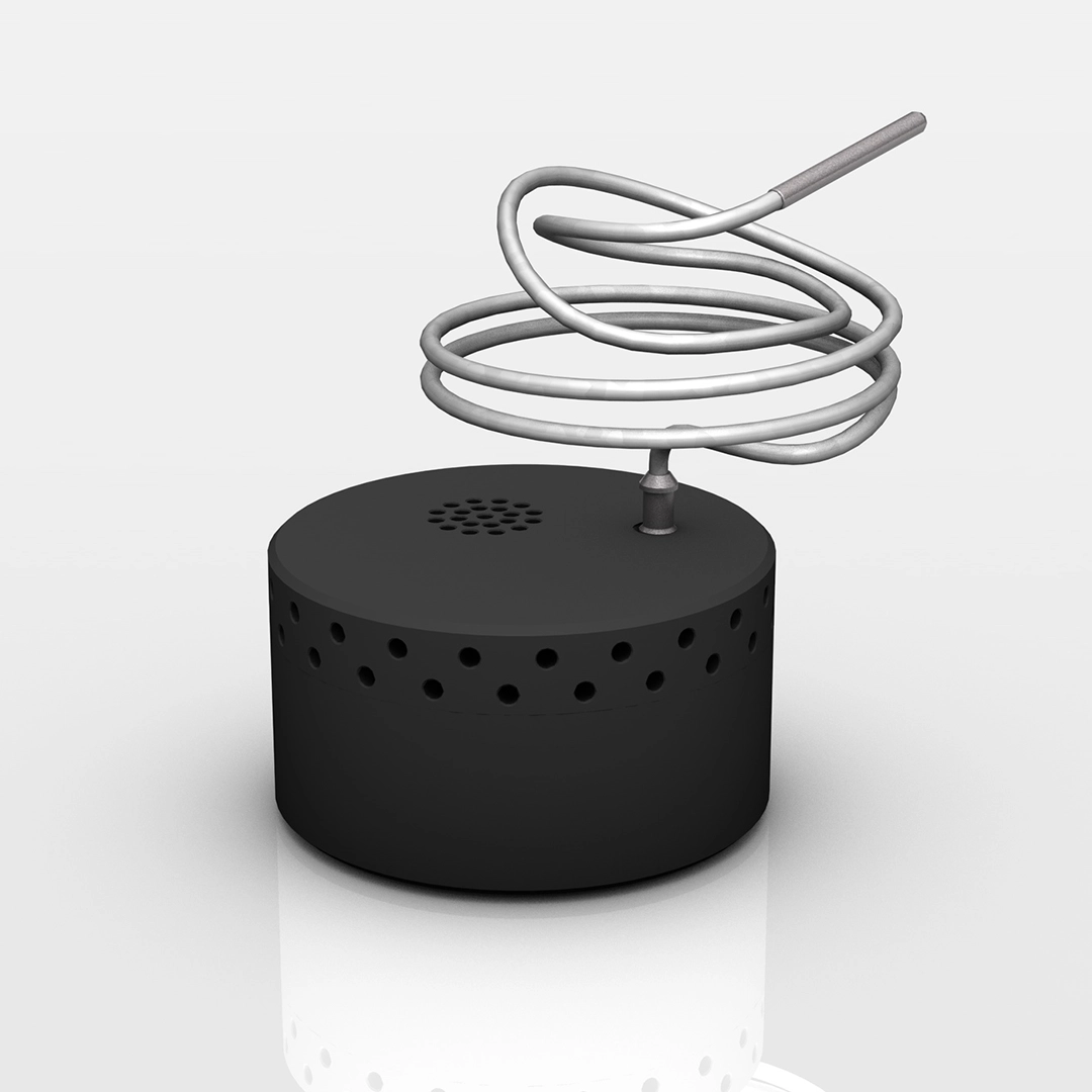 Black cylindrical device with circular holes around the top edge and a coiled metal tube extending upward from its center.