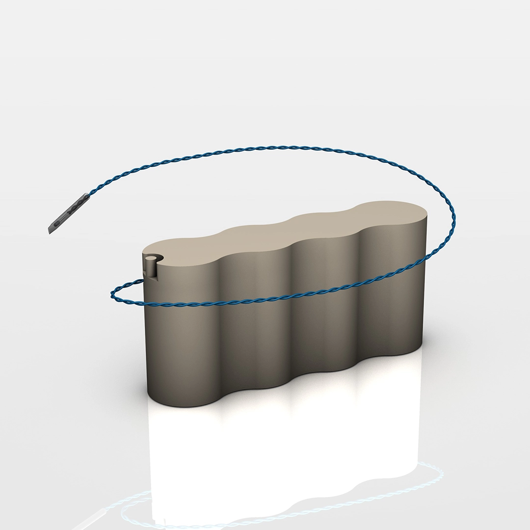 Gray cylindrical battery pack with blue twisted wire and connector attached.
