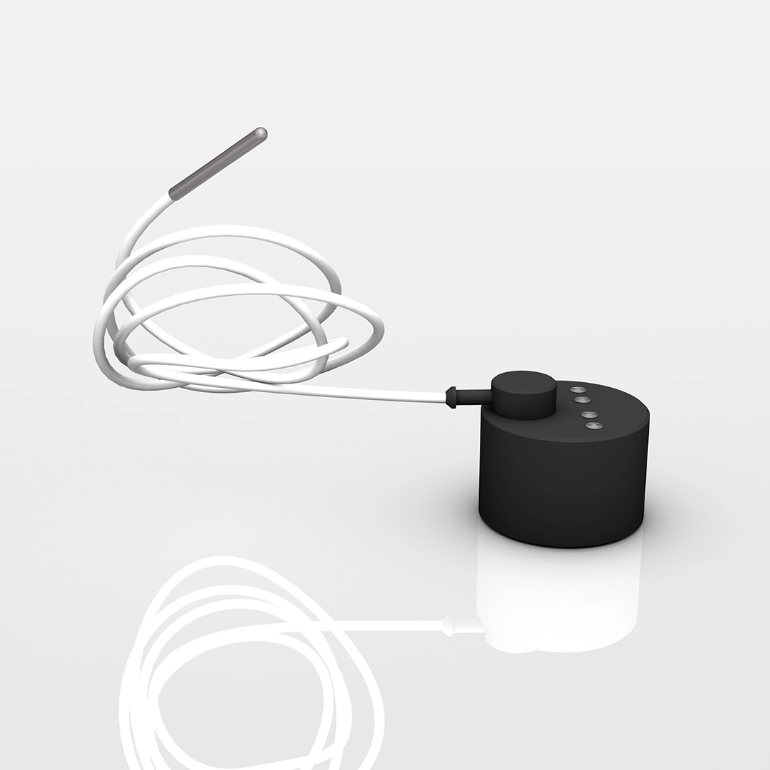 Black cylindrical electronic device connected to a coiled white cable with a gray tip, reflected on a glossy white surface.