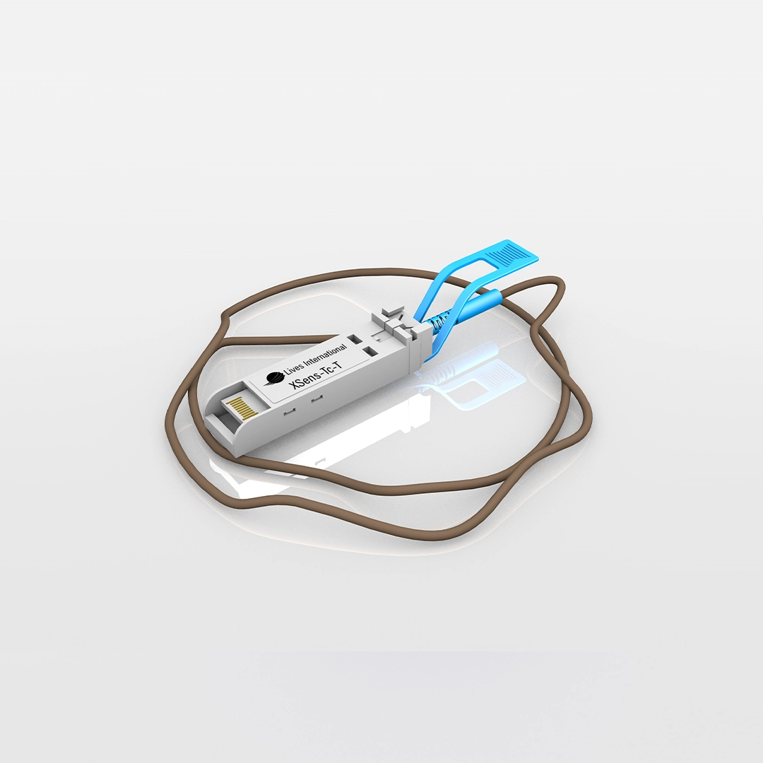 XSens-Tc-T wired sensor device with a blue clip and brown cable on a white background.