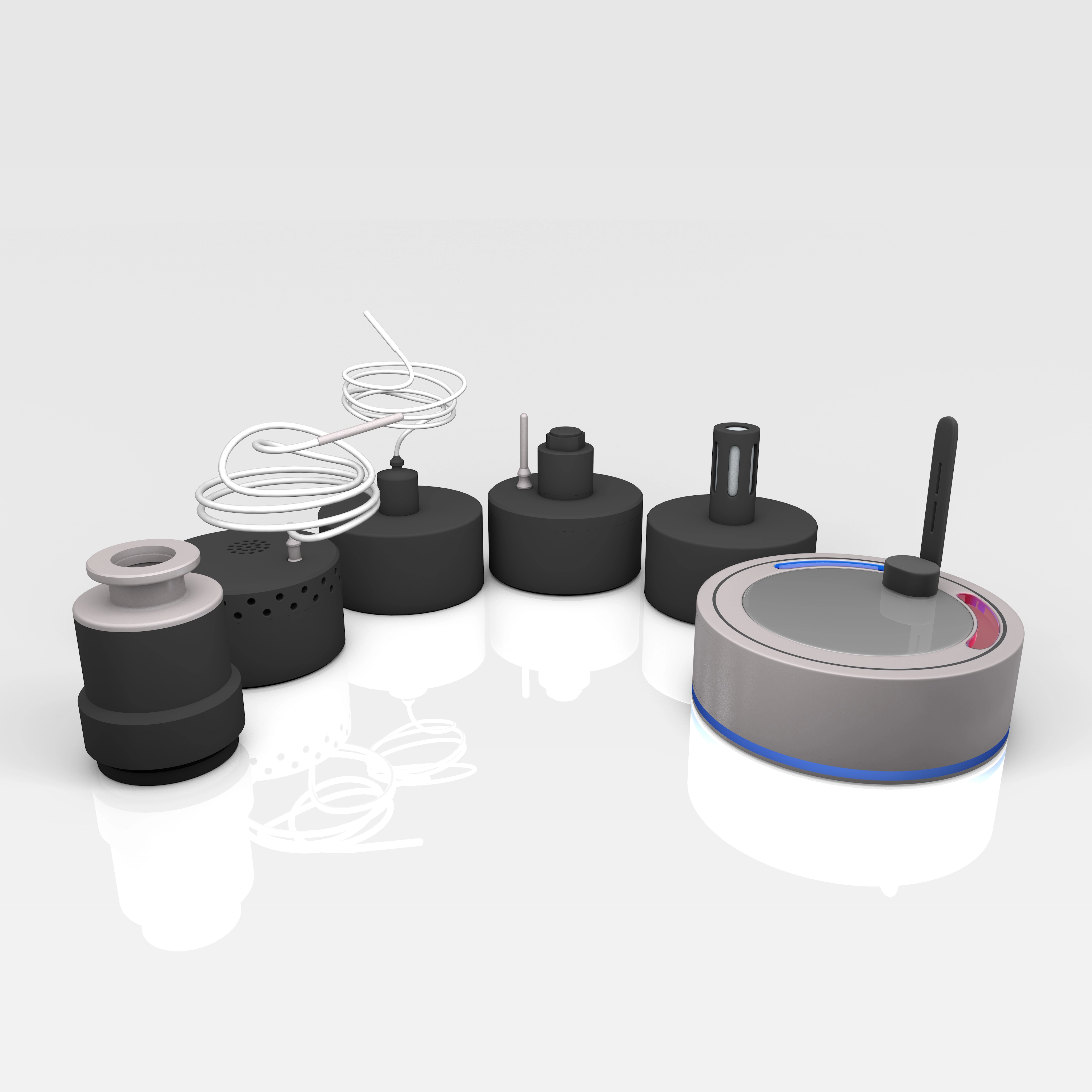 Six black and gray cylindrical electronic devices with antennas and sensors displayed in a row on a reflective white surface.