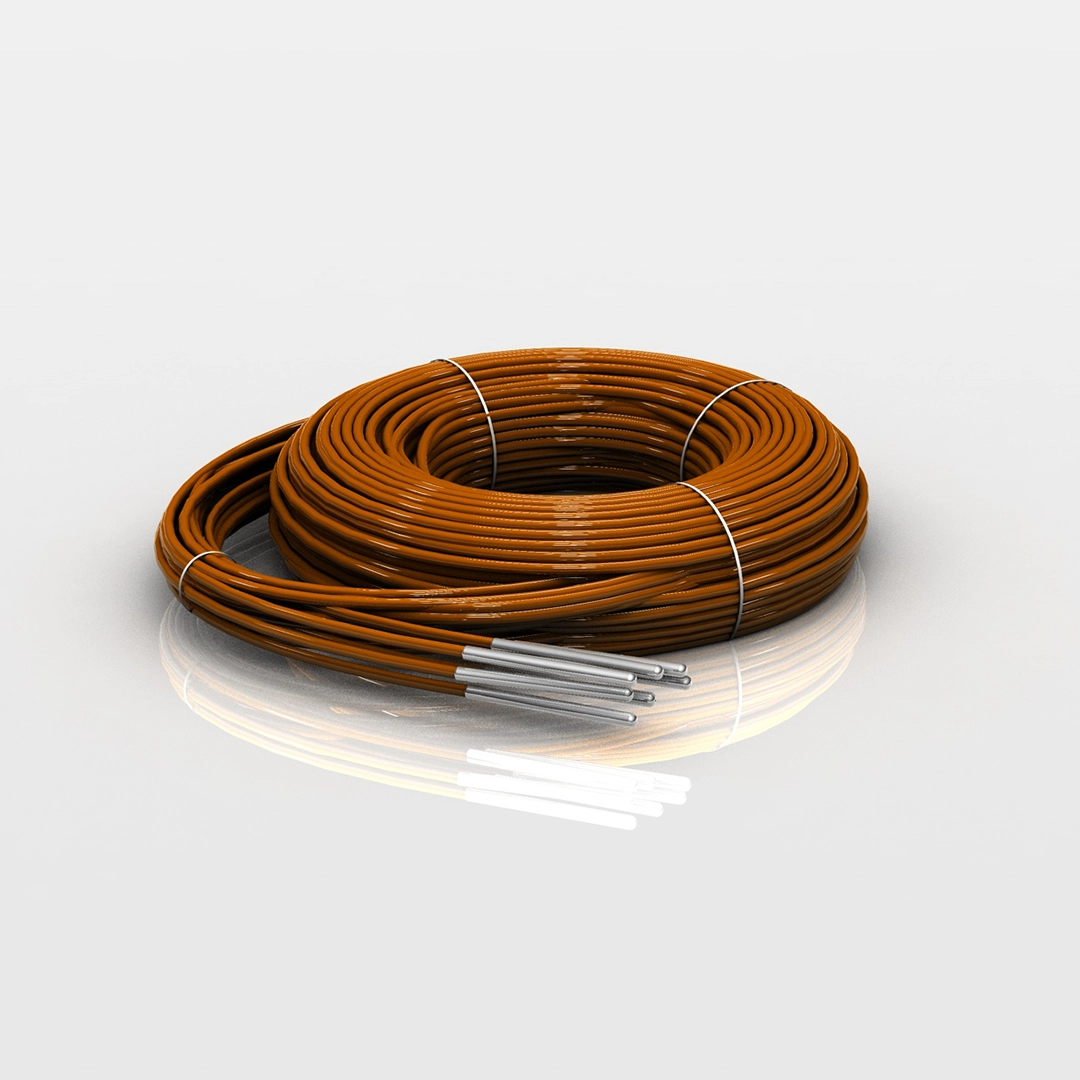 Coiled brown thermocouple wires with silver metal tips on a reflective surface.