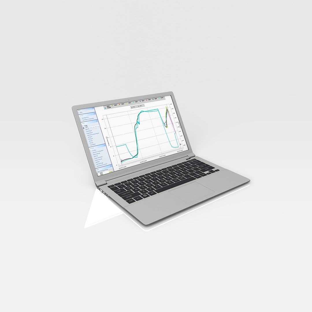 Silver laptop displaying a data graph with fluctuating lines on a light gray background.