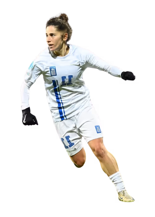 Female soccer player in white uniform running and looking to her left.