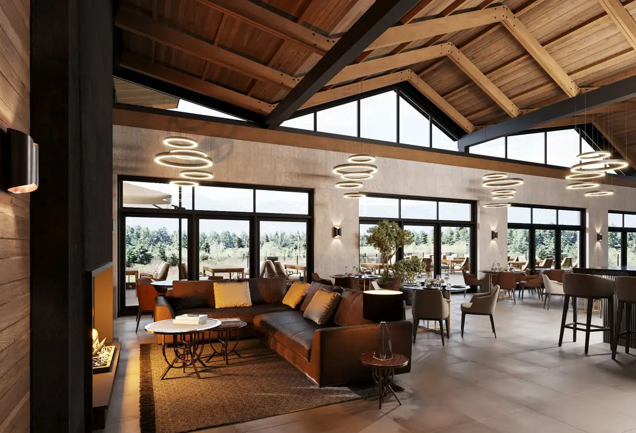 Spacious modern lounge area with a brown leather sectional sofa, circular coffee tables, a lit fireplace, large windows showing an outdoor view, and wooden ceiling beams with ring-shaped pendant lights.