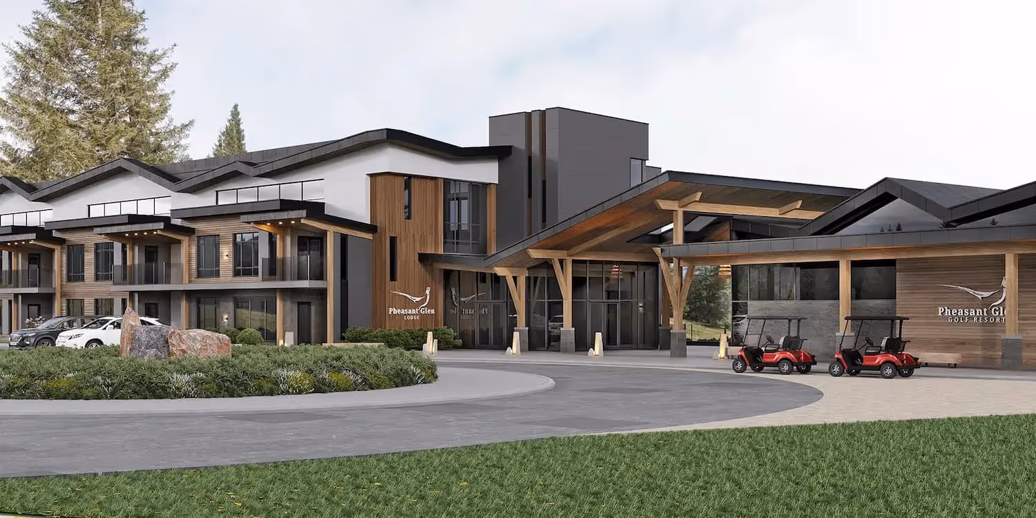 Modern resort building with wooden and glass facade, two red golf carts outside, and landscaping with trees and rocks.