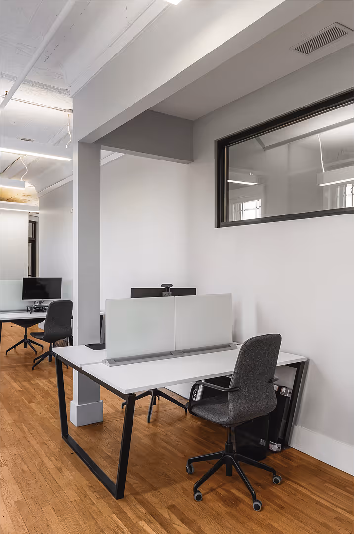 A couple desks inside of 106 Public Square