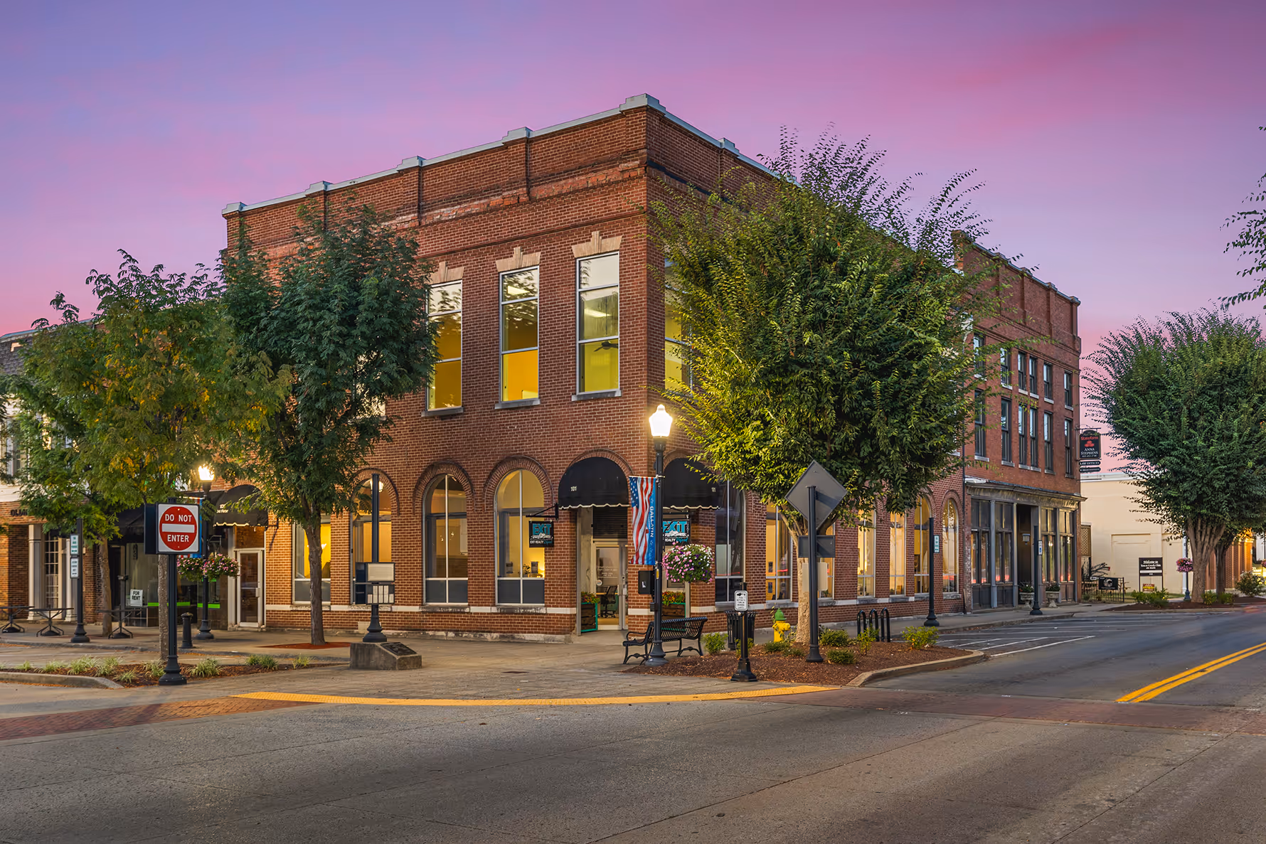 An isometric image of 101 Public Square from the street corner during a sunset in the evening.