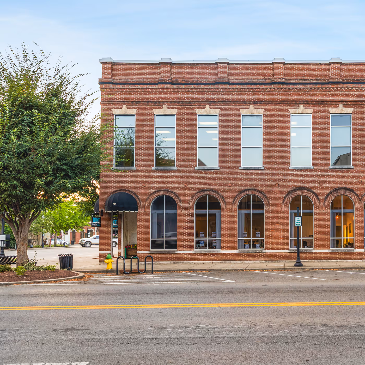Straight forward shot of the side of 101 Public Square from the outside during the day.