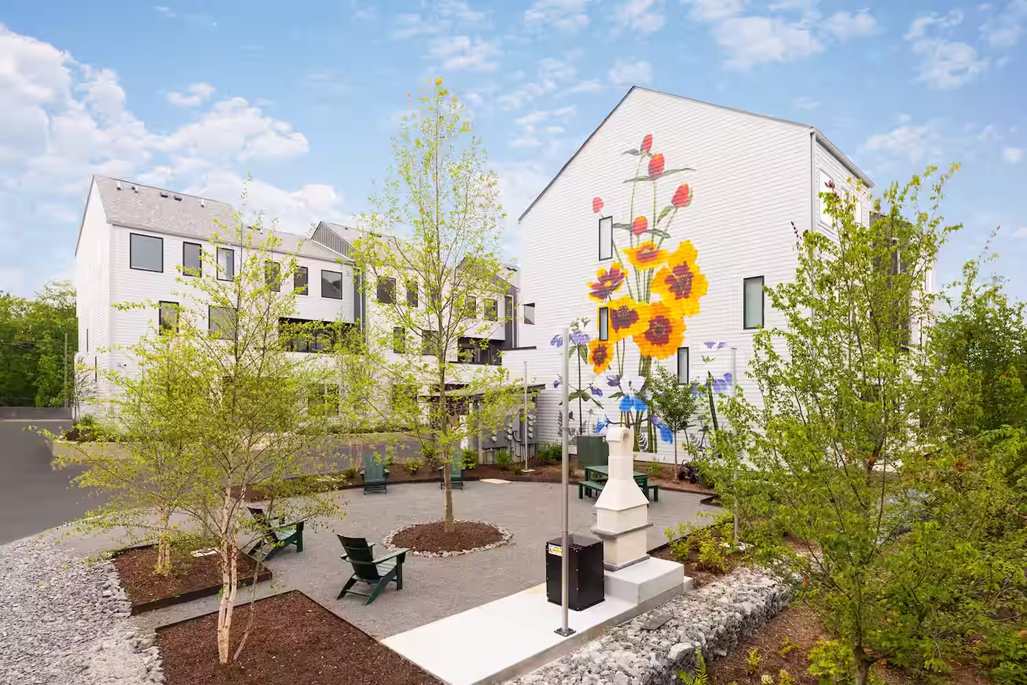 Community garden and seating area in a condominium complex.