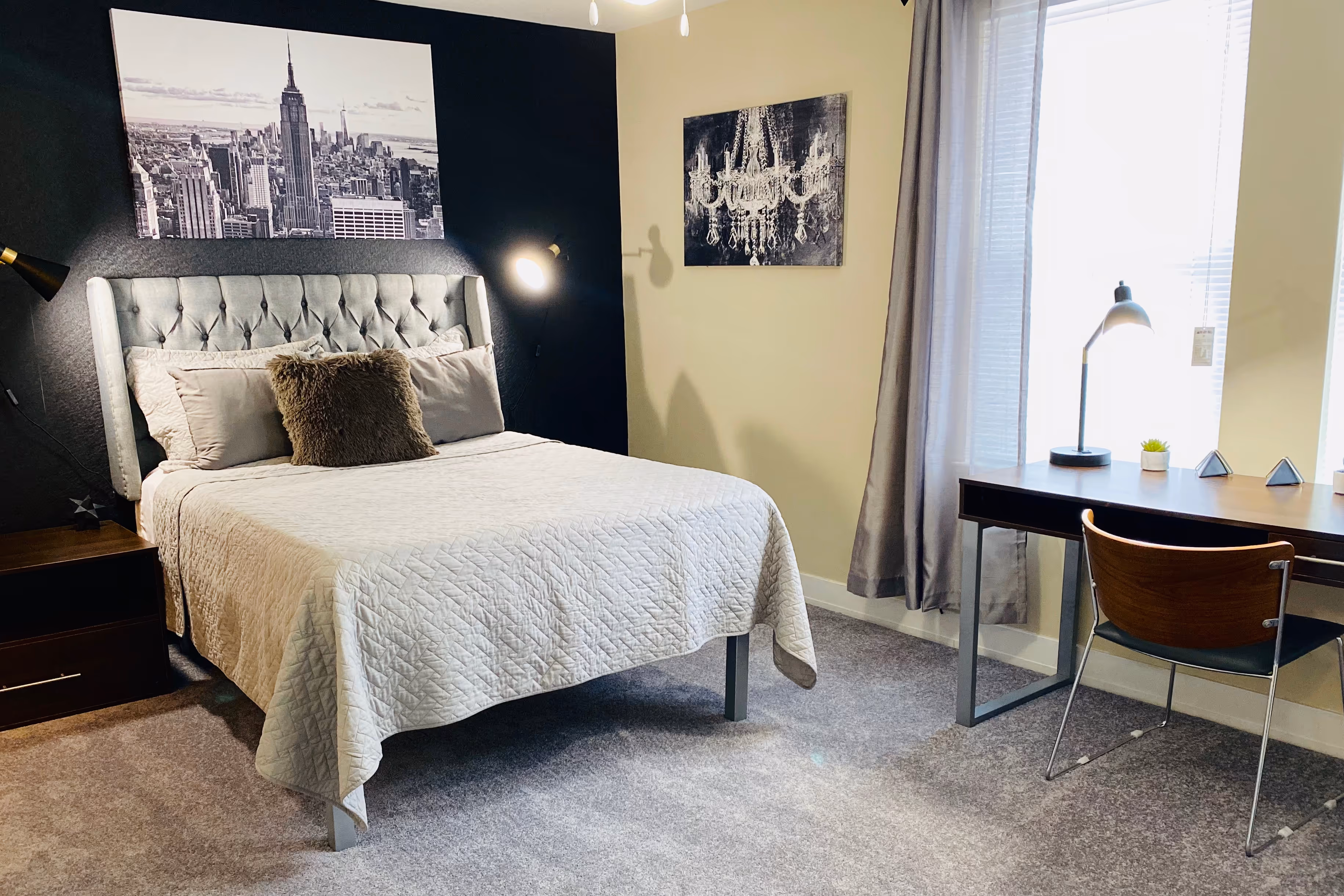 Furnished bedroom with computer desk 