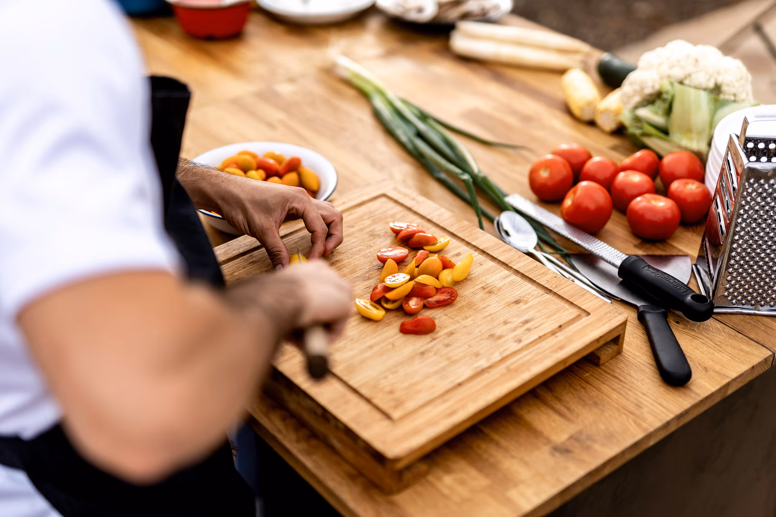Chef cooking with fresh ingredients