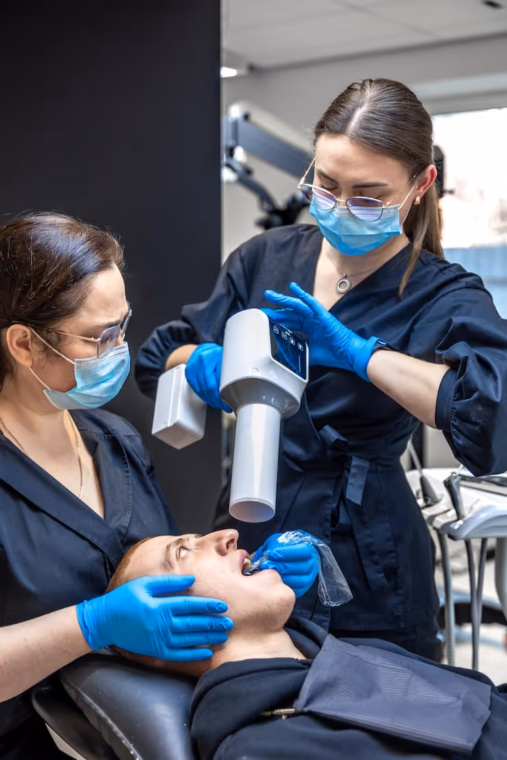 The Century Dental East team treating a patient at the Pine Beach, NJ office
