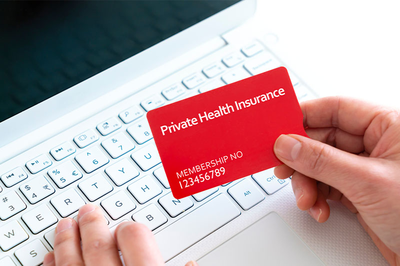 A nurse smiling towards the camera