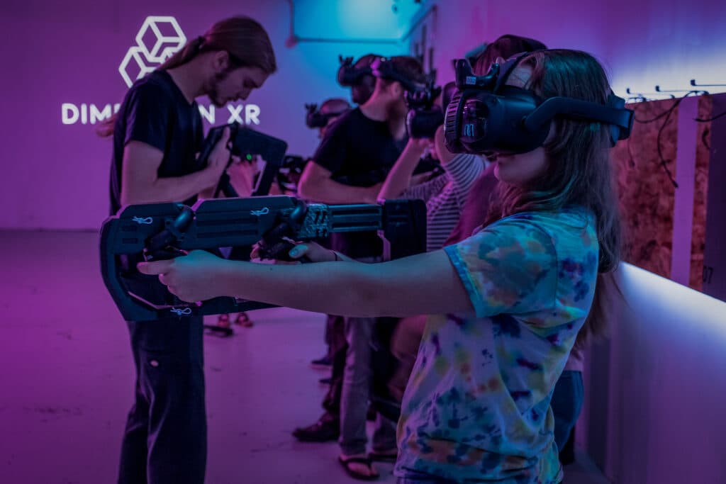 image of park with people enjoying rides