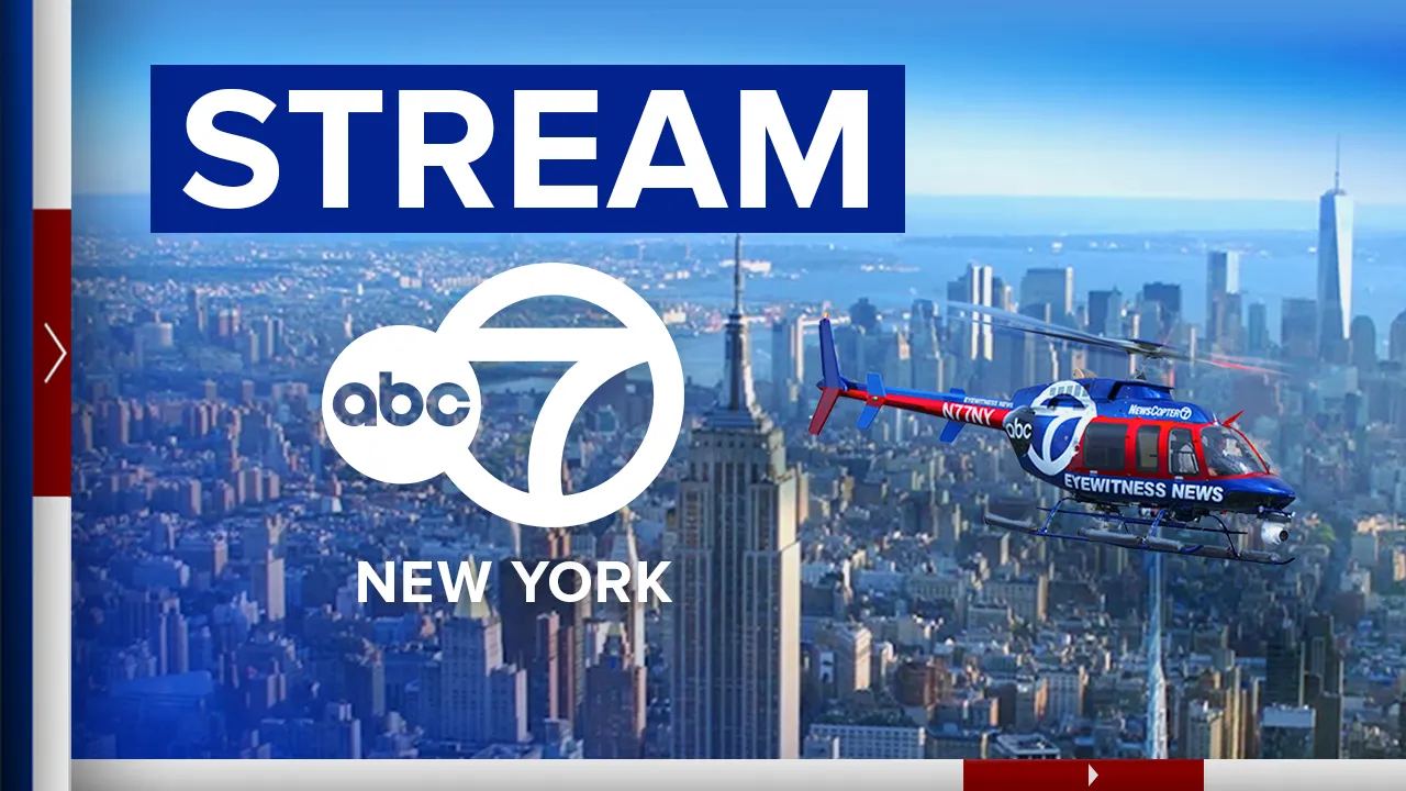 ABC 7 New York Eyewitness News helicopter flying over Manhattan skyline with Empire State Building and One World Trade Center.