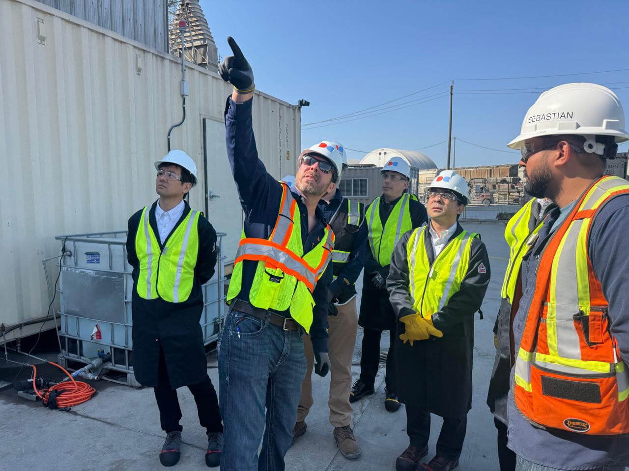 Bruce Logue gives partners a tour of the Tucson Technology Center
