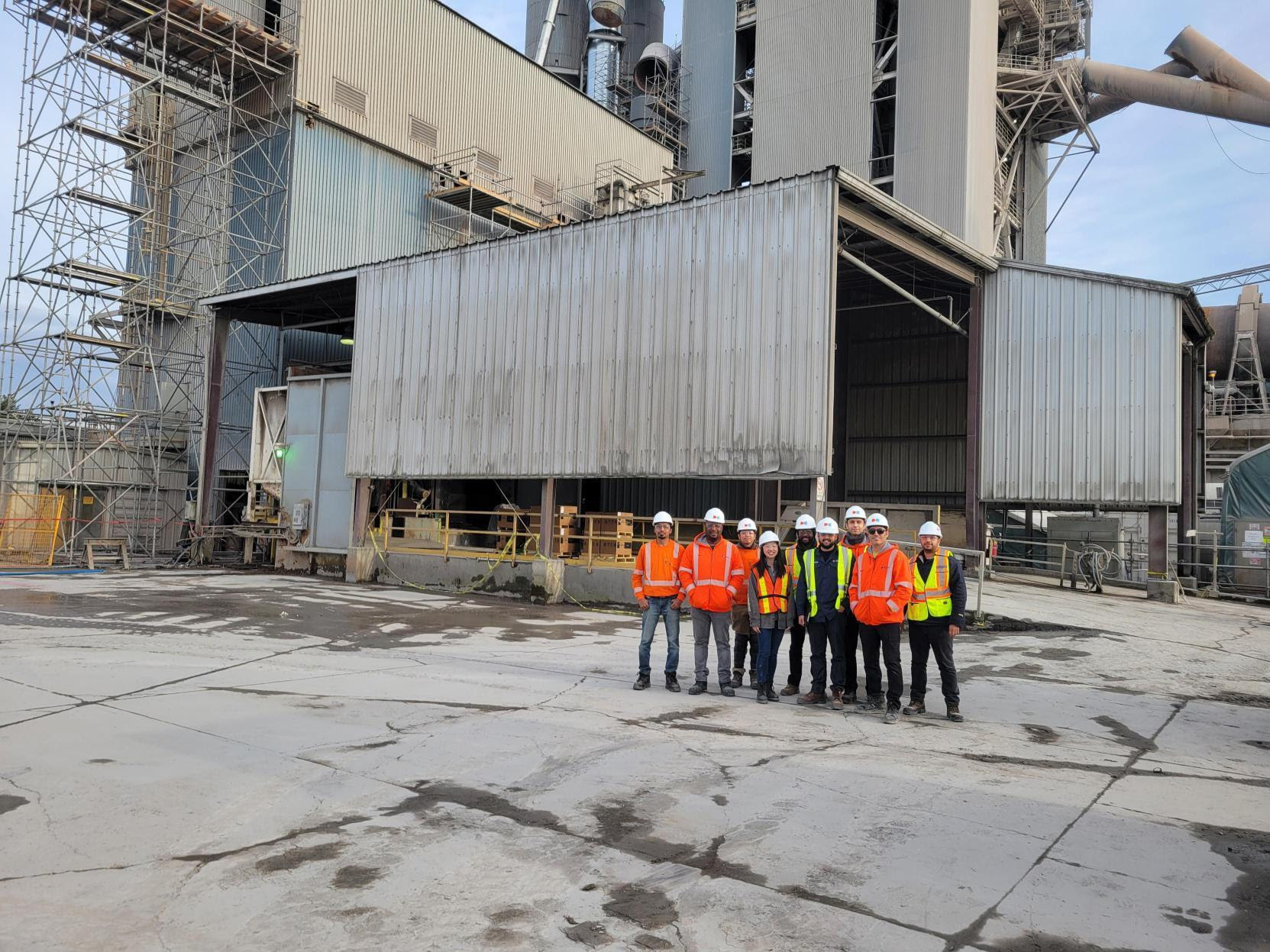 Our operators and engineers stand in the location of our future point-source plant in Canada.