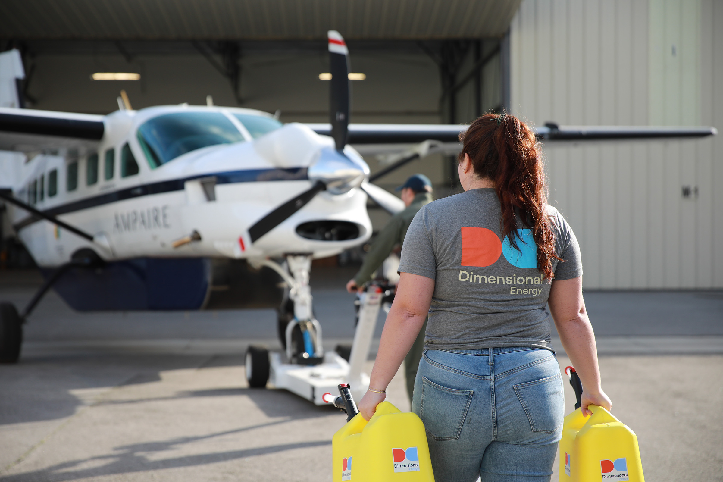 Meagan Helton carried Dimensional Energy's SAF for Ampaire's first ever ground test using 100% SAF in their hybrid electric plane.
