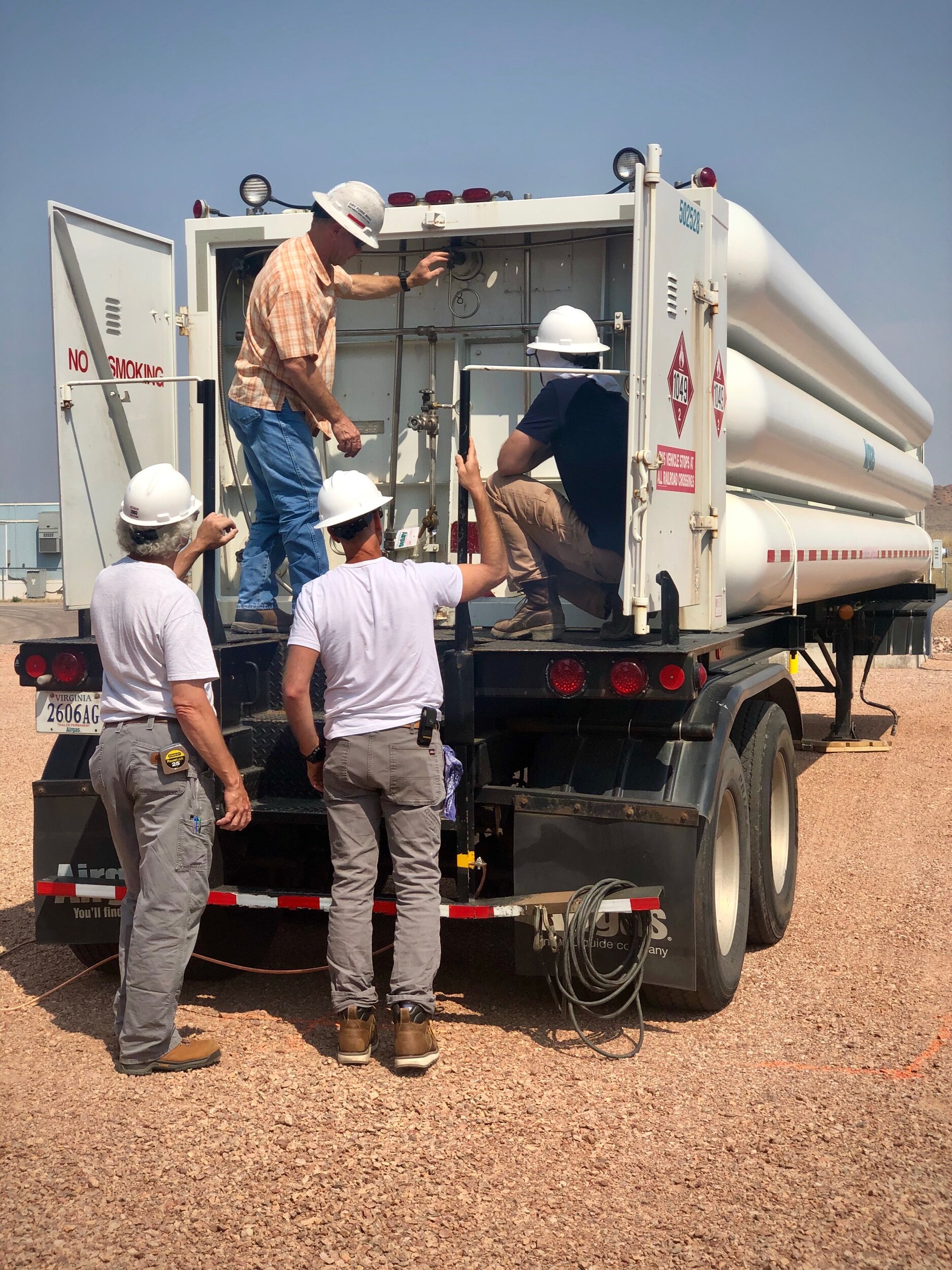 Local treasure Jim Ford runs a tight ship on the ground at the ITC. Here he runs the senior engineers through safety protocol around the hydrogen trailer—no smoking.