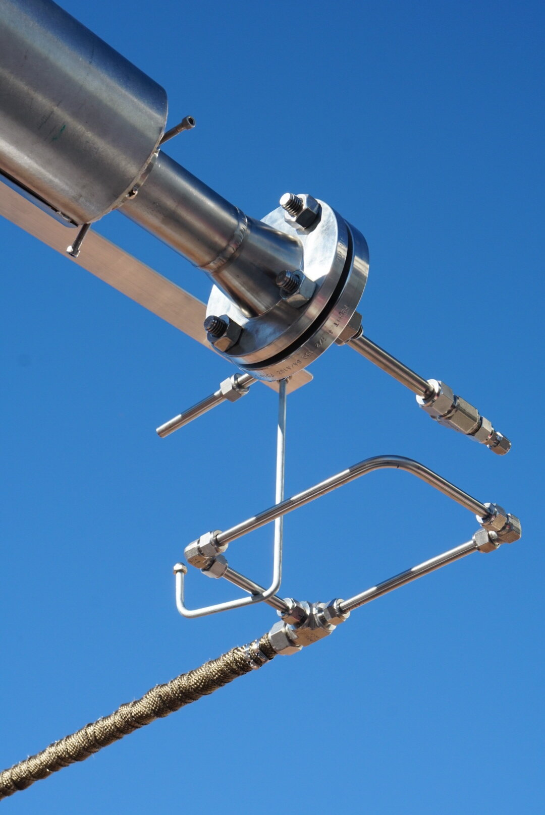 Our gas line (resting in a closed loop from our pressure test), ready to be attached to the reactor.