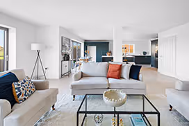 Living room with white couches