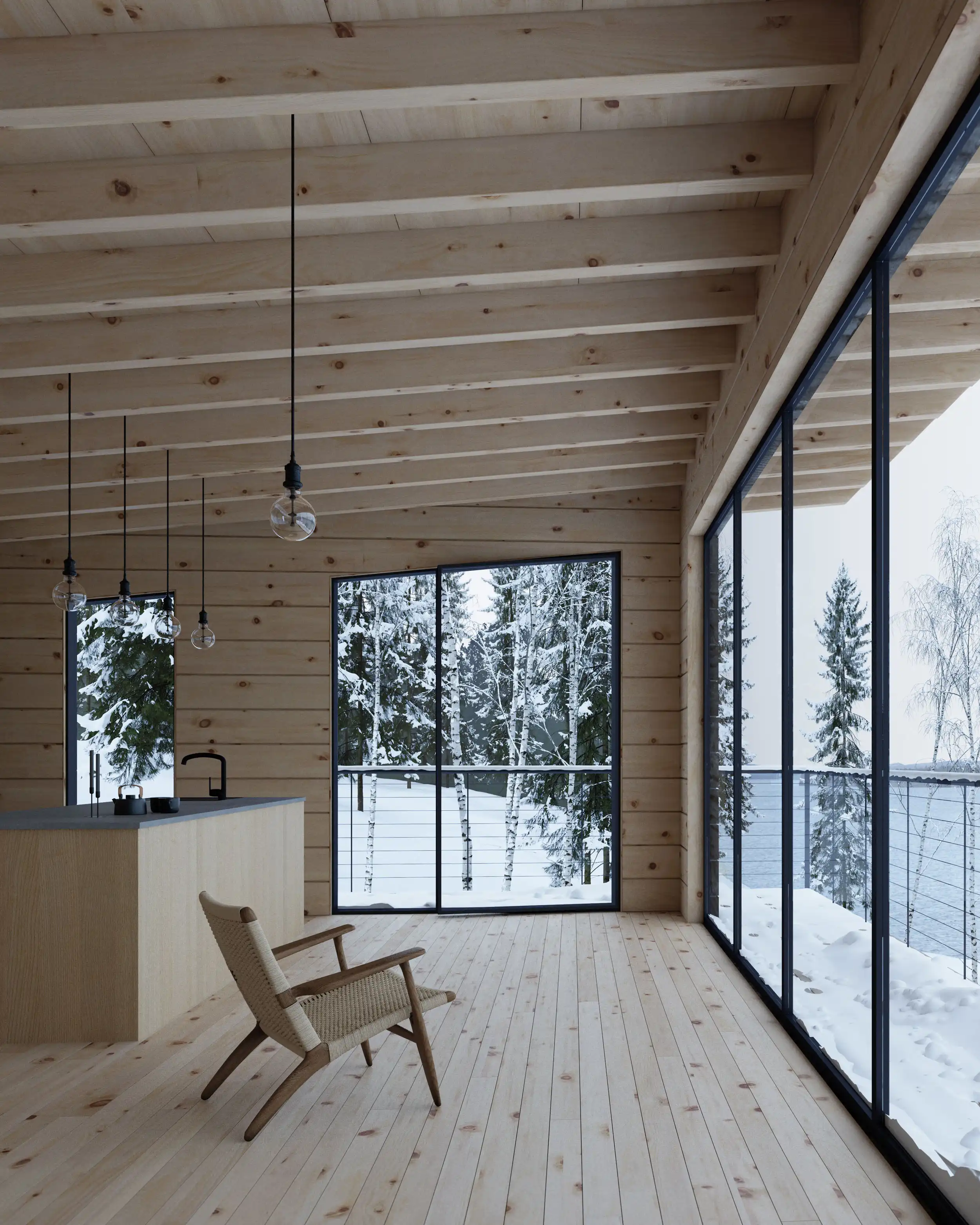 Minimalist wooden interior with large floor-to-ceiling windows showing snowy trees and a lake, featuring a woven lounge chair and pendant lights.