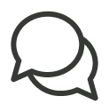 Two overlapping speech bubbles representing conversation or communication.