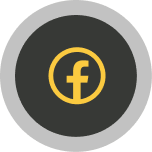 Facebook icon in yellow on dark gray circular background.